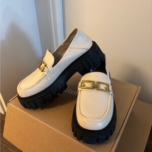Chic Cream Loafers with Gold Detail